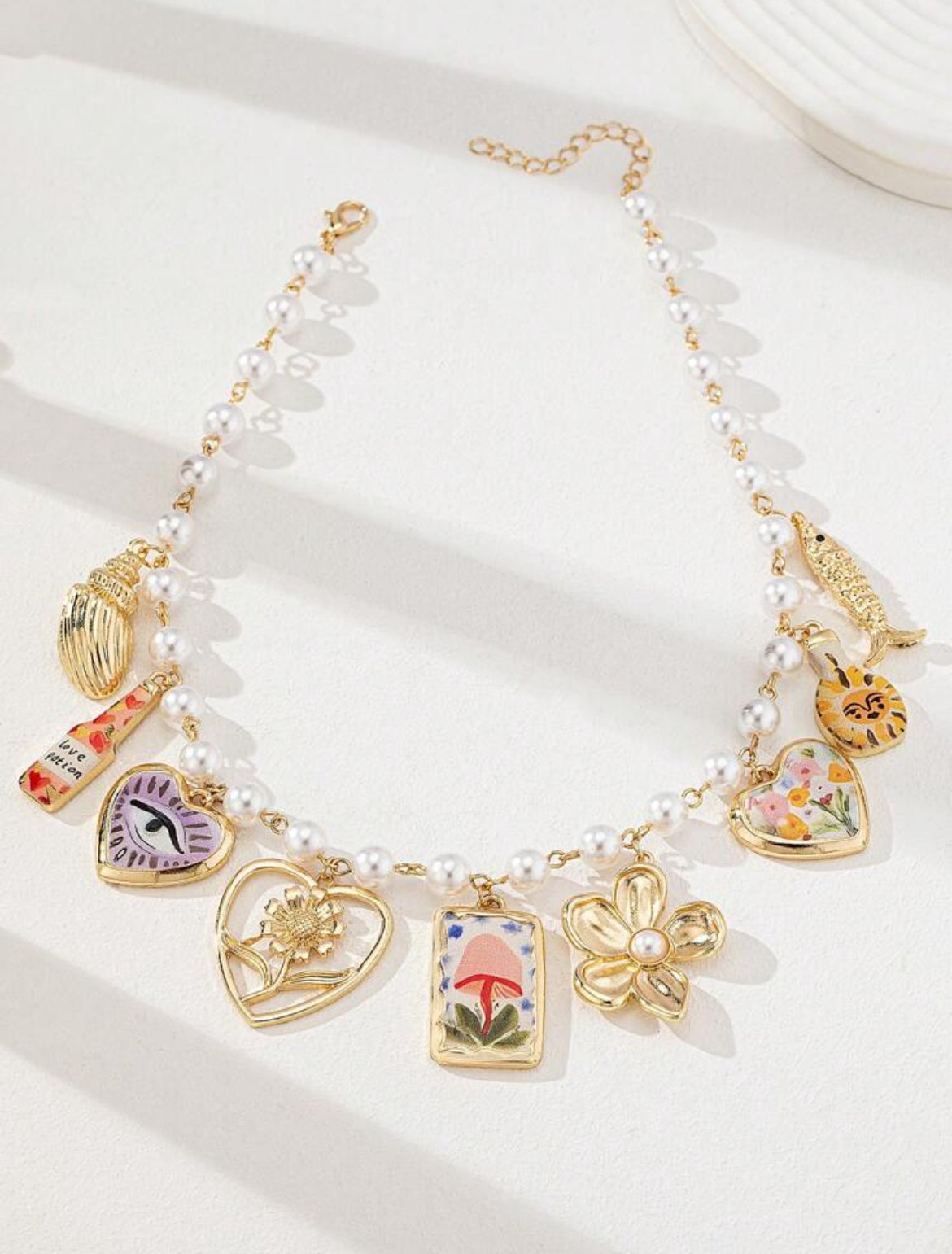 Delicate Beaded Necklace with Heart Locket & Floral Charms