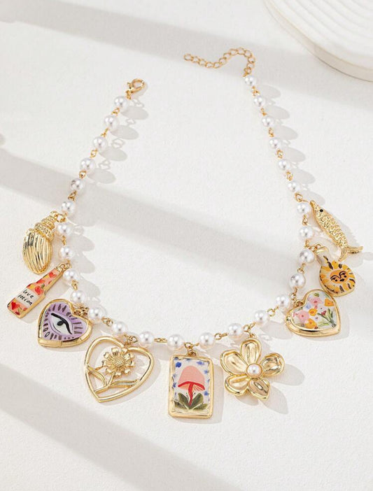 Delicate Beaded Necklace with Heart Locket & Floral Charms